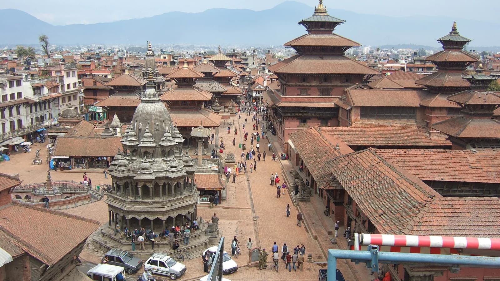 Temples and open paved courtyard of Patan Durbar Square in the Kathmandu Valley