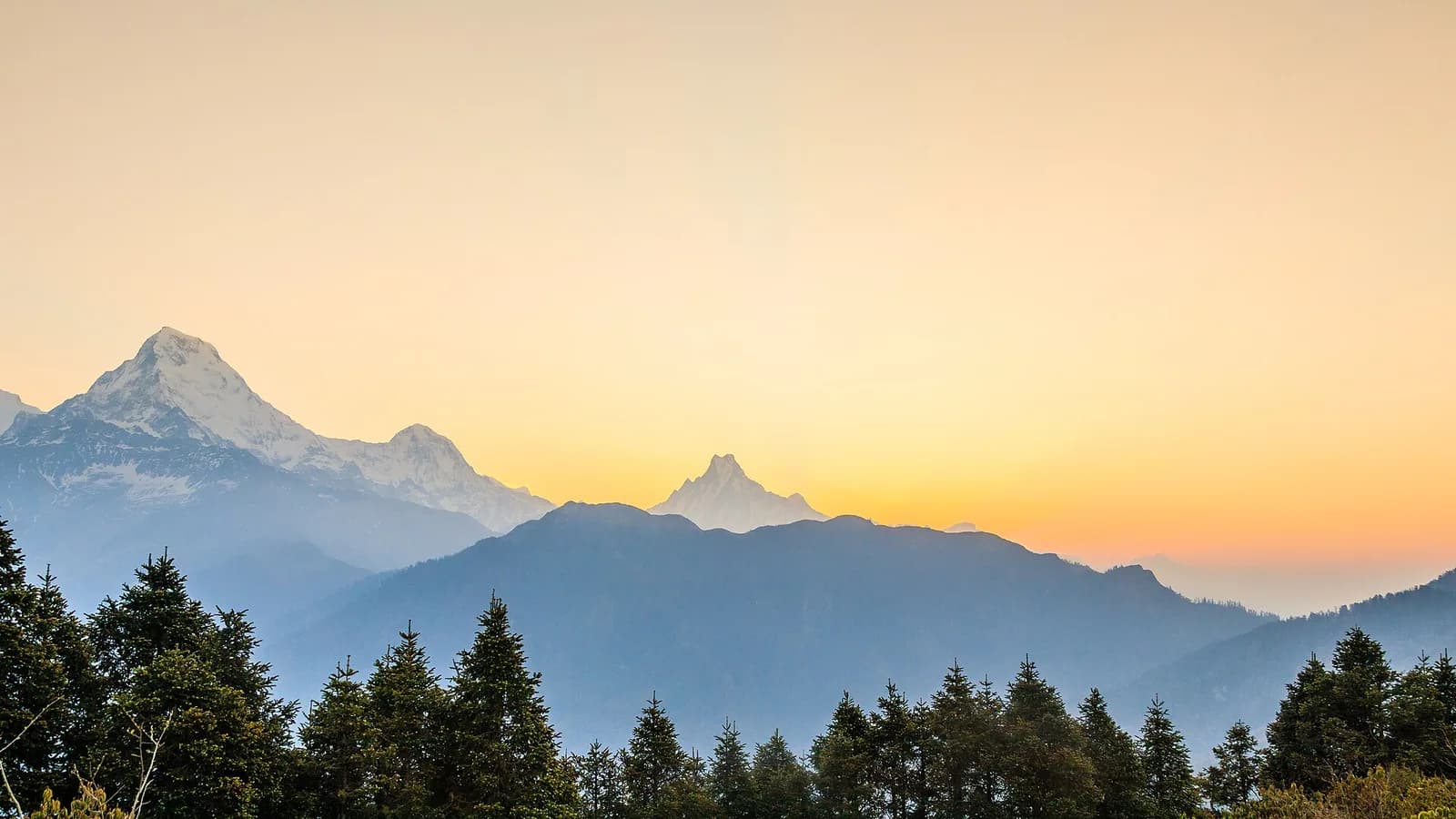 The snow-and-ice south face of Annapurna I rising above the Annapurna Sanctuary, the high-mountain backdrop to the Annapurna 100 ultra race
