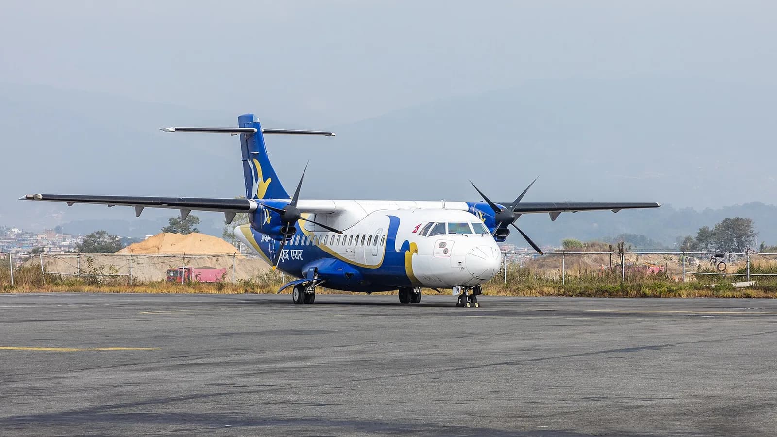 Aircraft and cargo on the tarmac at Kathmandu's Tribhuvan International Airport in Nepal