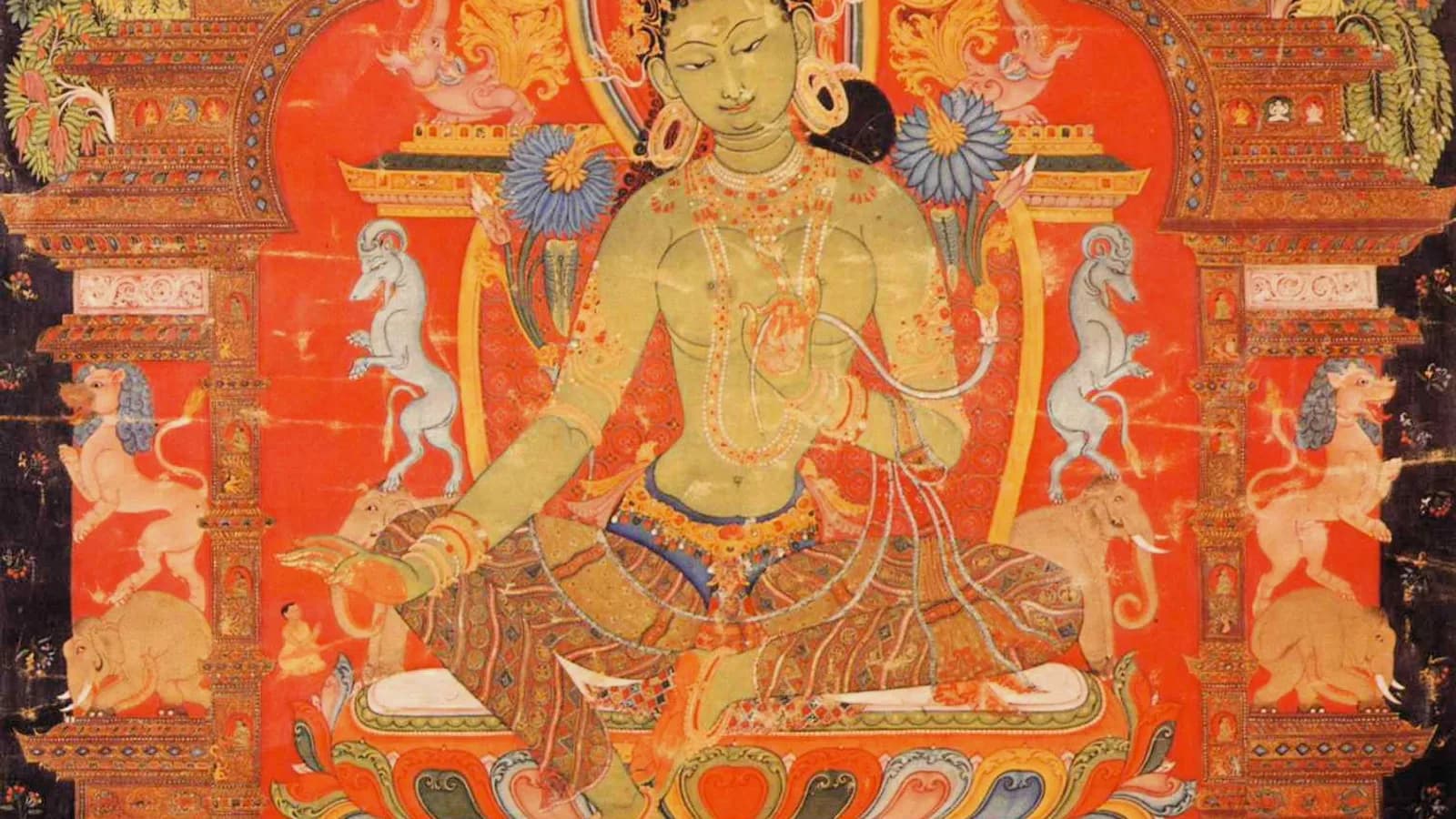A detailed Himalayan thangka of Green Tara on cloth, the kind of piece a buyer might commission or carry home from Nepal