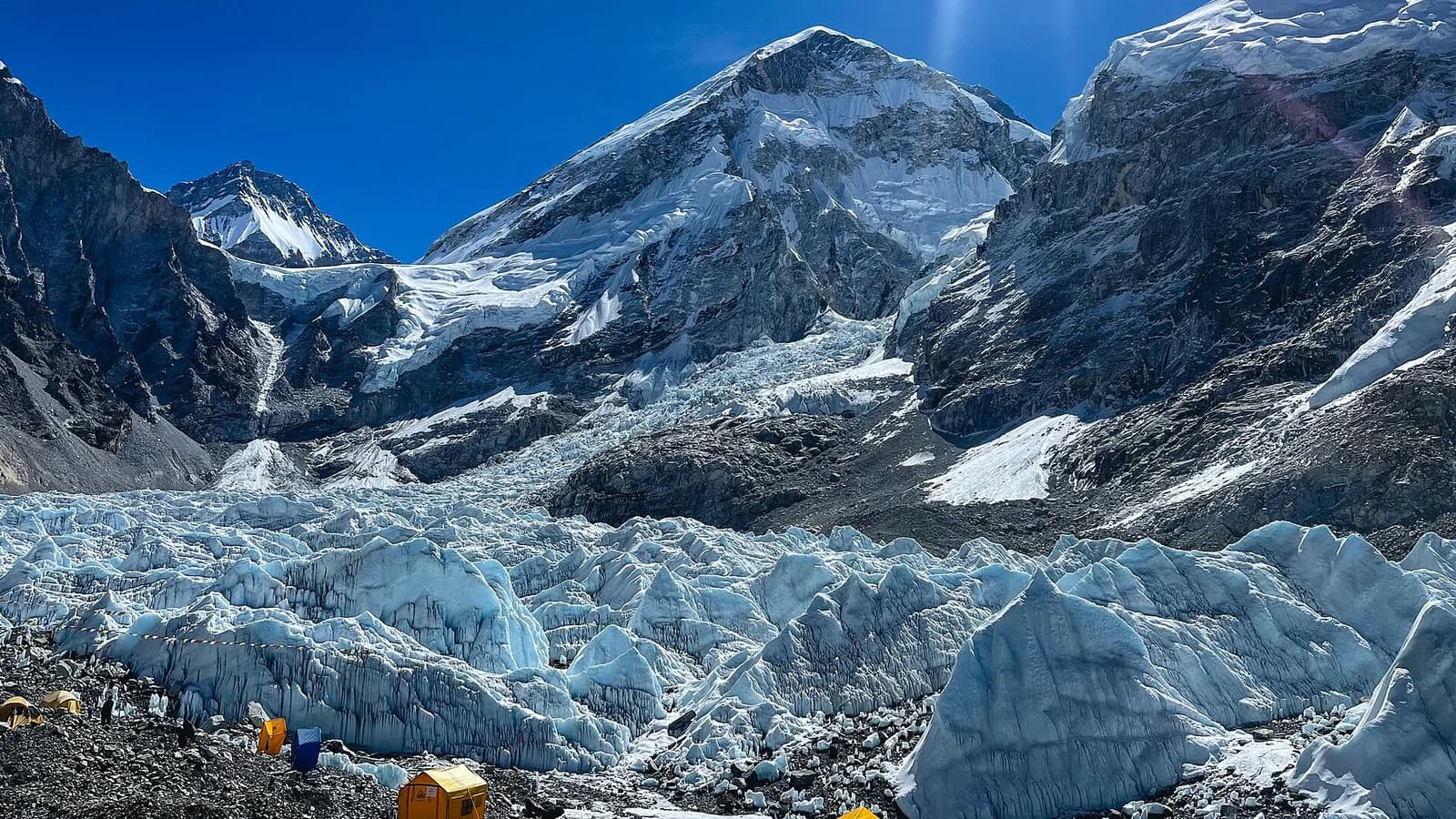 Snow-covered Himalayan peaks rising above the clouds, the high-altitude range where Nepal's proposed 7,000-metre qualifying climbs would take place