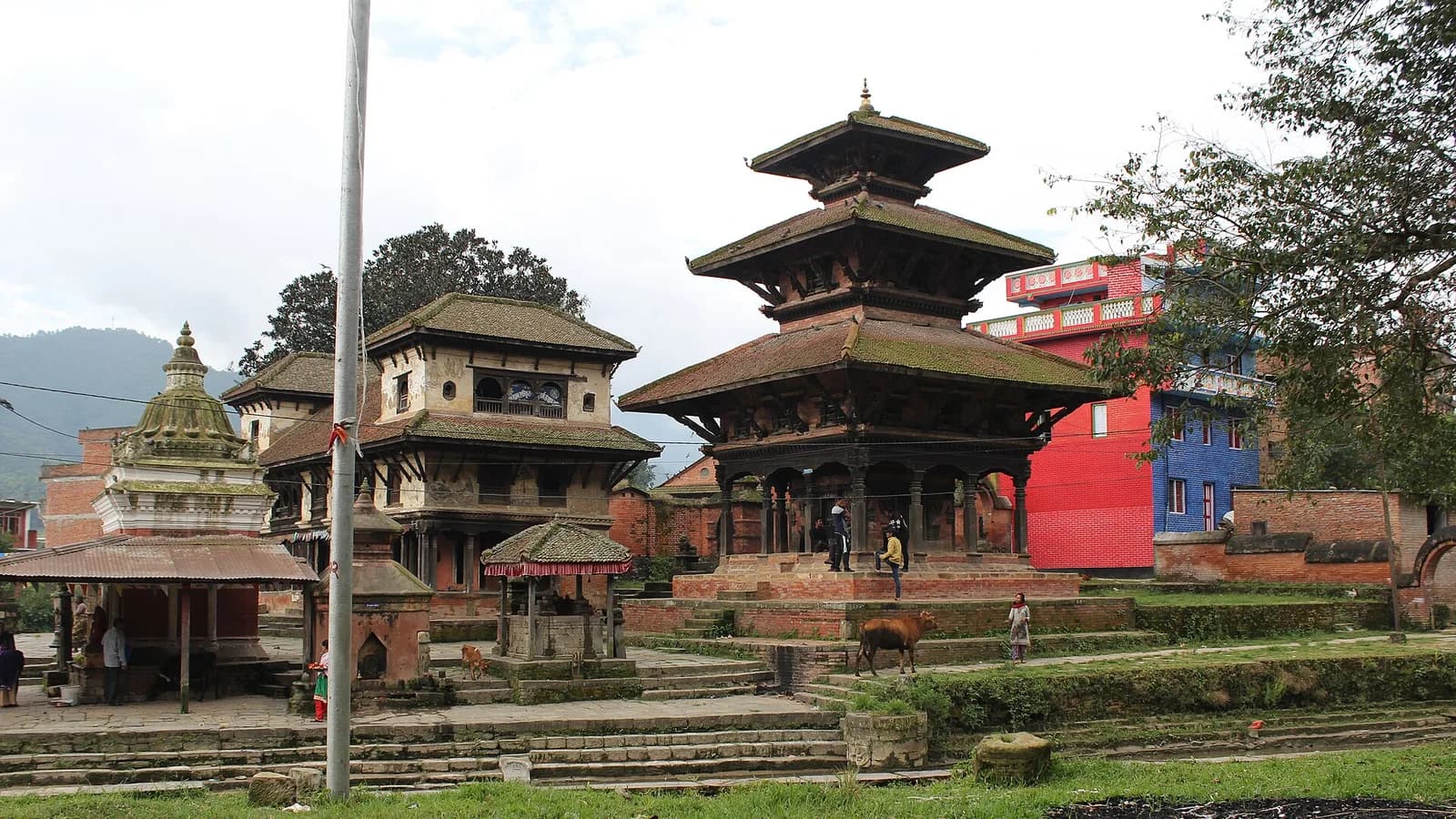 Brick-paved temple courtyard with traditional Newari pagoda architecture in the heritage town of Panauti, Nepal.