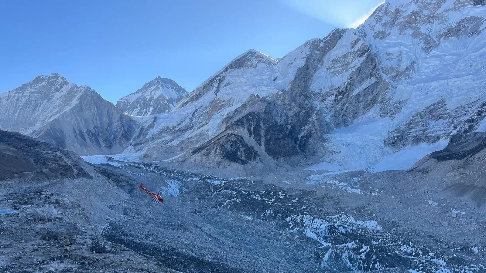 Trekkers on the trail toward Everest Base Camp with Himalayan peaks ahead