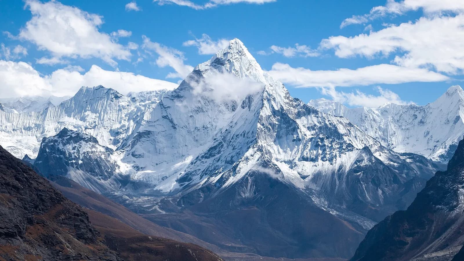 A snow-covered Himalayan trail and peaks seen from Rasuwa in northern Nepal