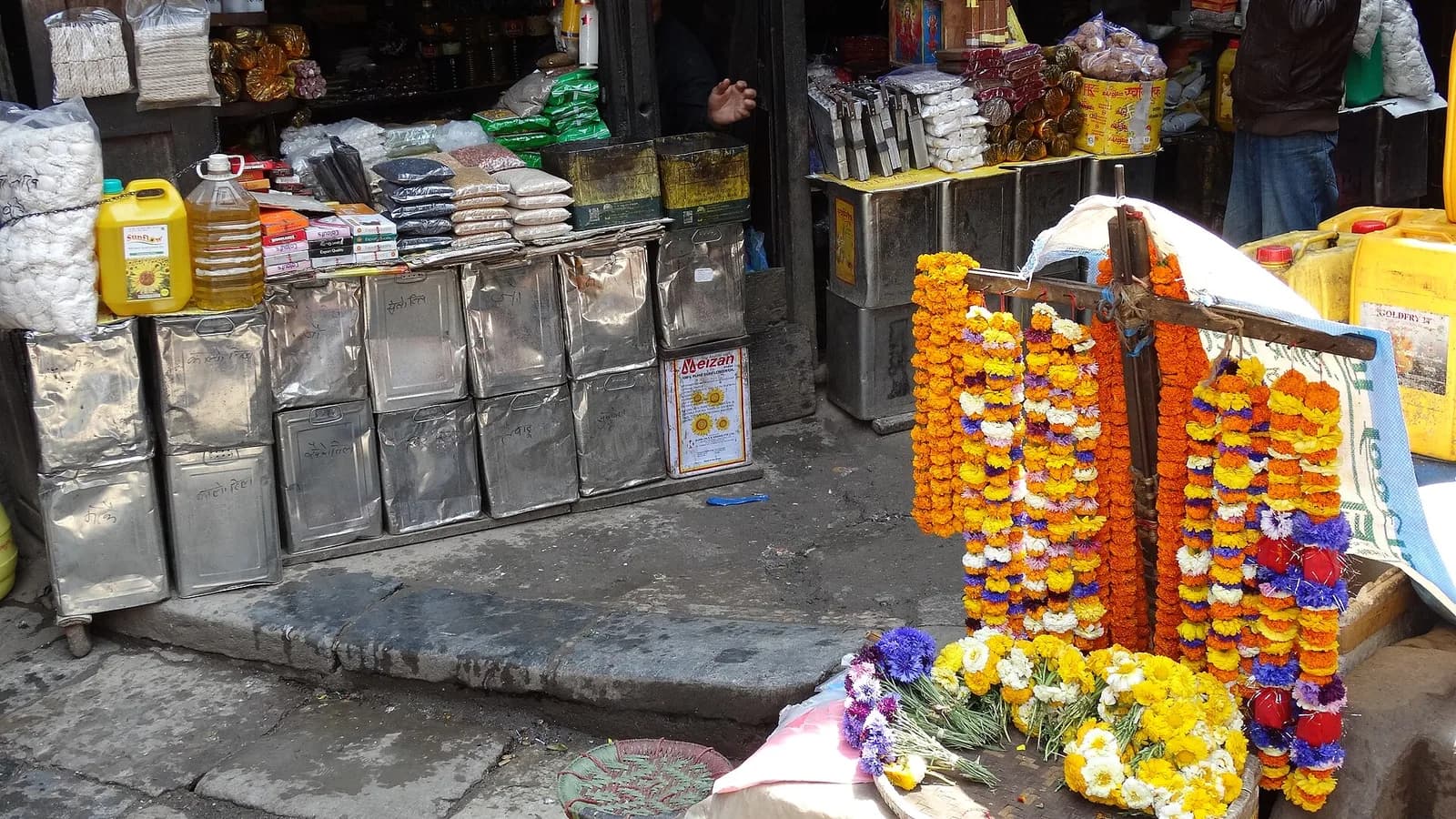 A narrow shop-lined street in the Thamel tourist district of Kathmandu, Nepal