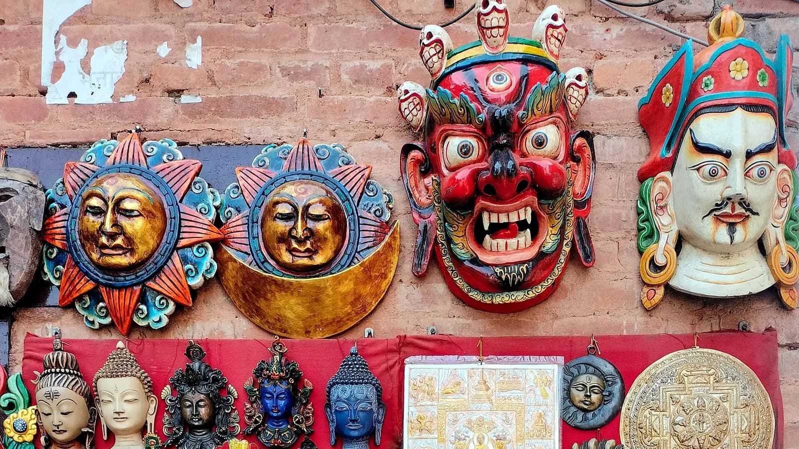The white dome and golden spire of Swayambhunath stupa with the painted eyes of the Buddha, set on a hilltop above the Kathmandu Valley