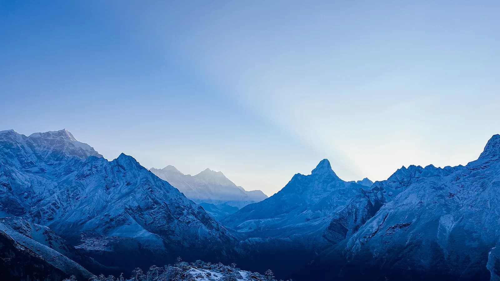 The snow-covered Himalayan range seen from above, with Mount Everest among the peaks